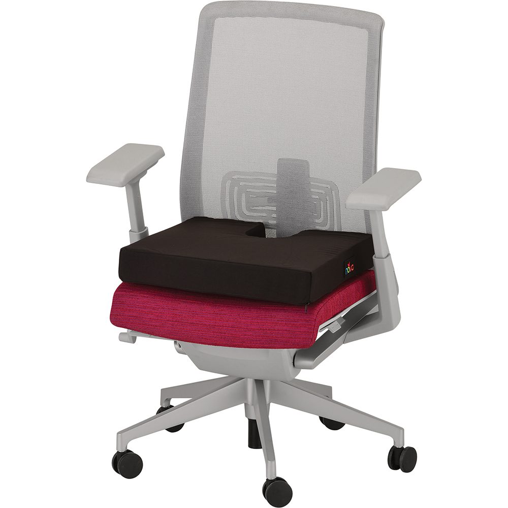 Gray mesh ergonomic chair with red seat cushion