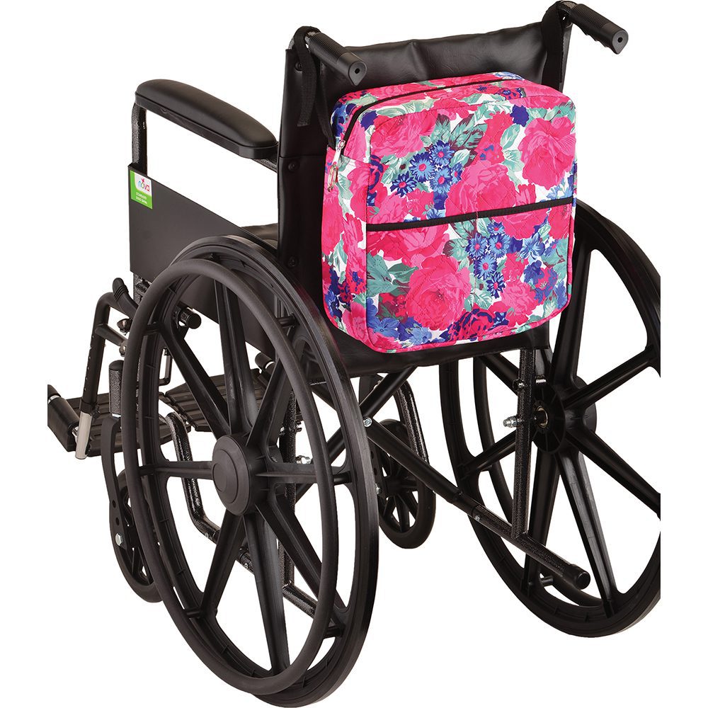 Wheelchair with pink floral backpack attached