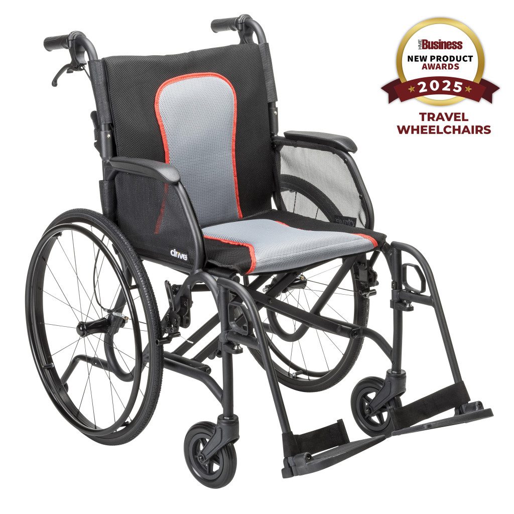 Lightweight travel wheelchair with gray and red upholstery