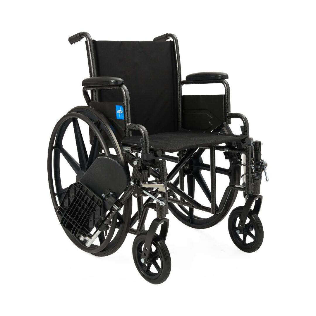Black manual wheelchair on white background