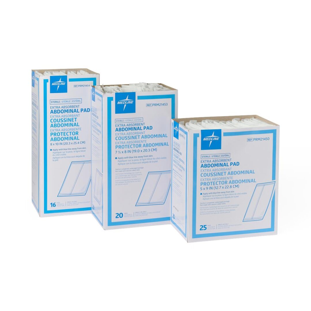 Three boxes of extra absorbent abdominal pads