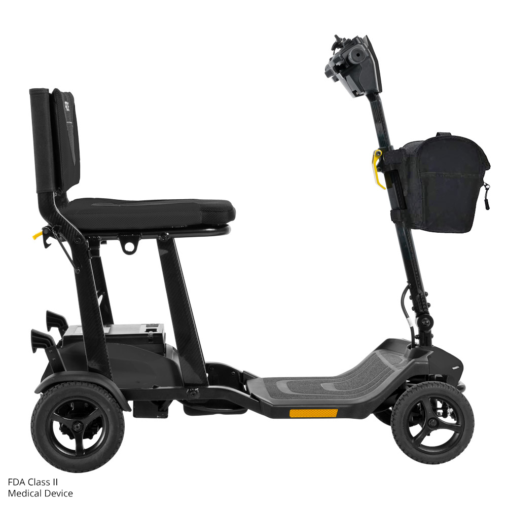 Compact black mobility scooter with storage pouch.