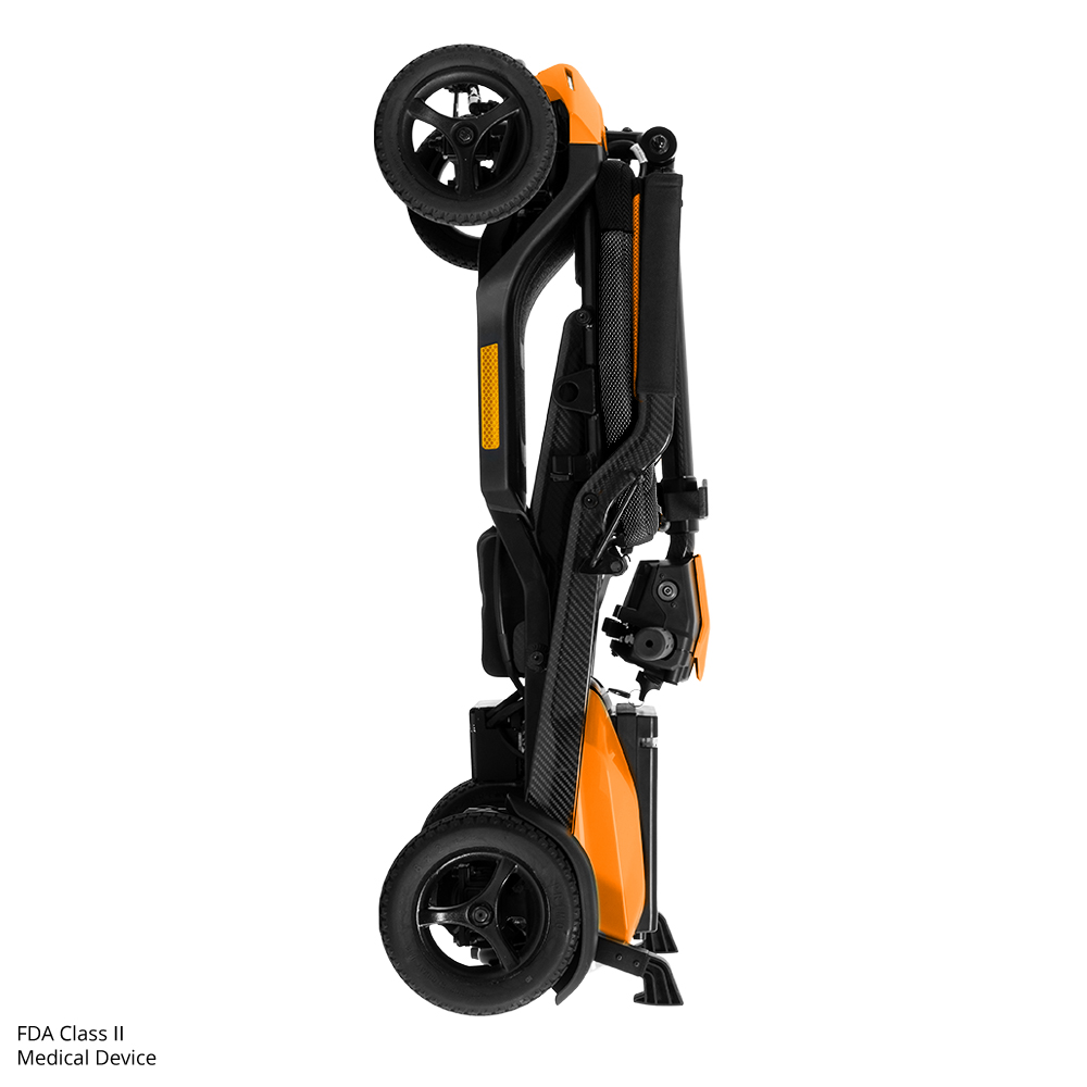 Folding orange wheelchair with compact design.