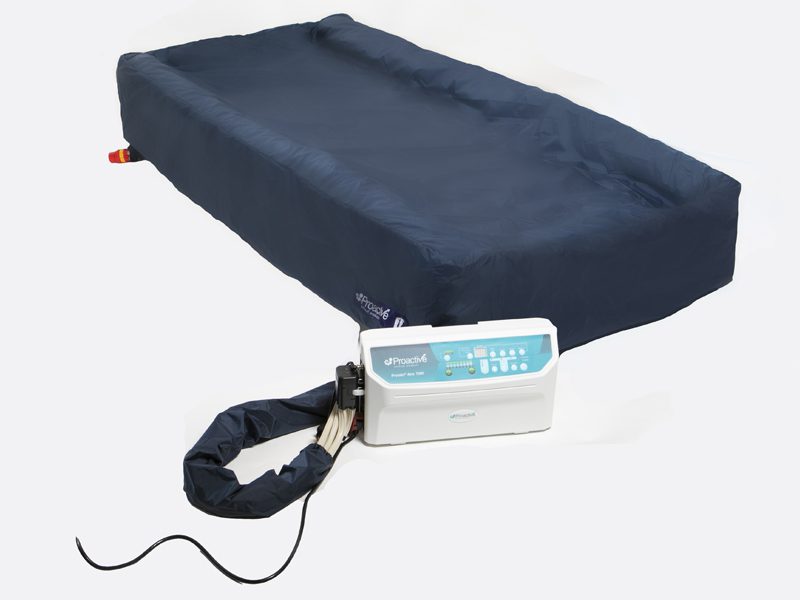 Blue alternating-pressure medical mattress with pump