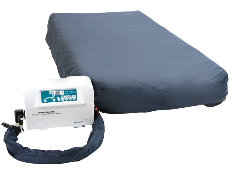 Alternating pressure medical mattress with pump
